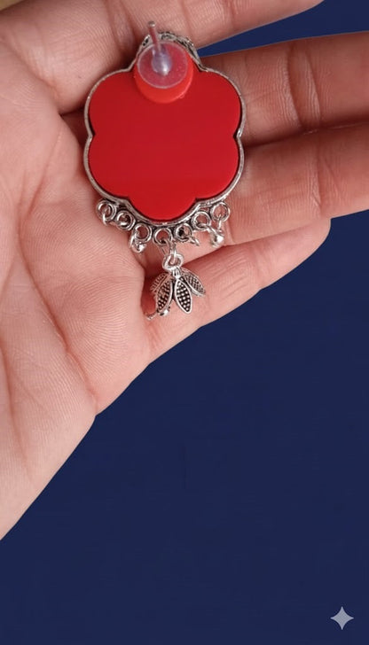 Red enamel floral design