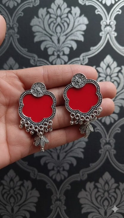Red enamel floral design